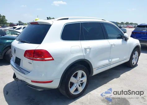 2014 Volkswagen Touareg Tdi Lux z USA, uszkodzony, nr VIN WVGEP9BP0ED001256